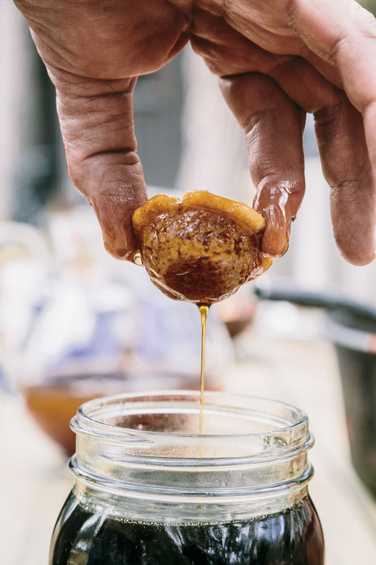 Syrup drips off a soaked cornbread muffin.
