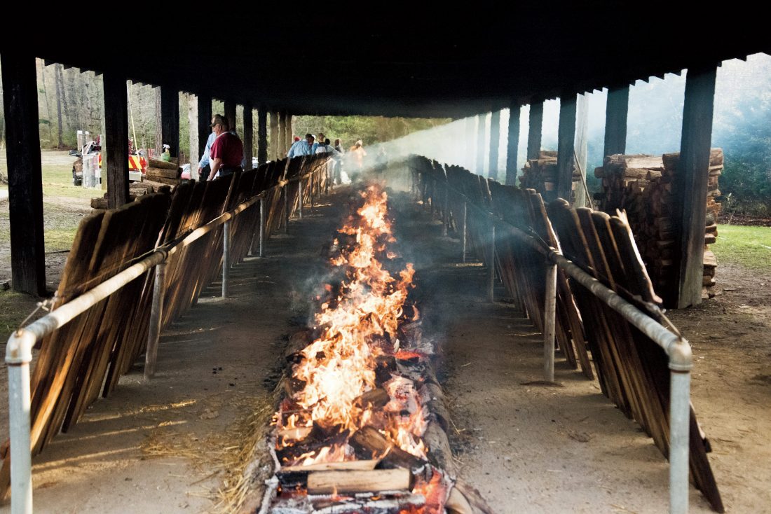 The fire is lit before the six hours it takes to plank a shad.