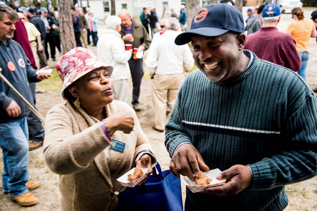 Attendees enjoy the food and fellowship.