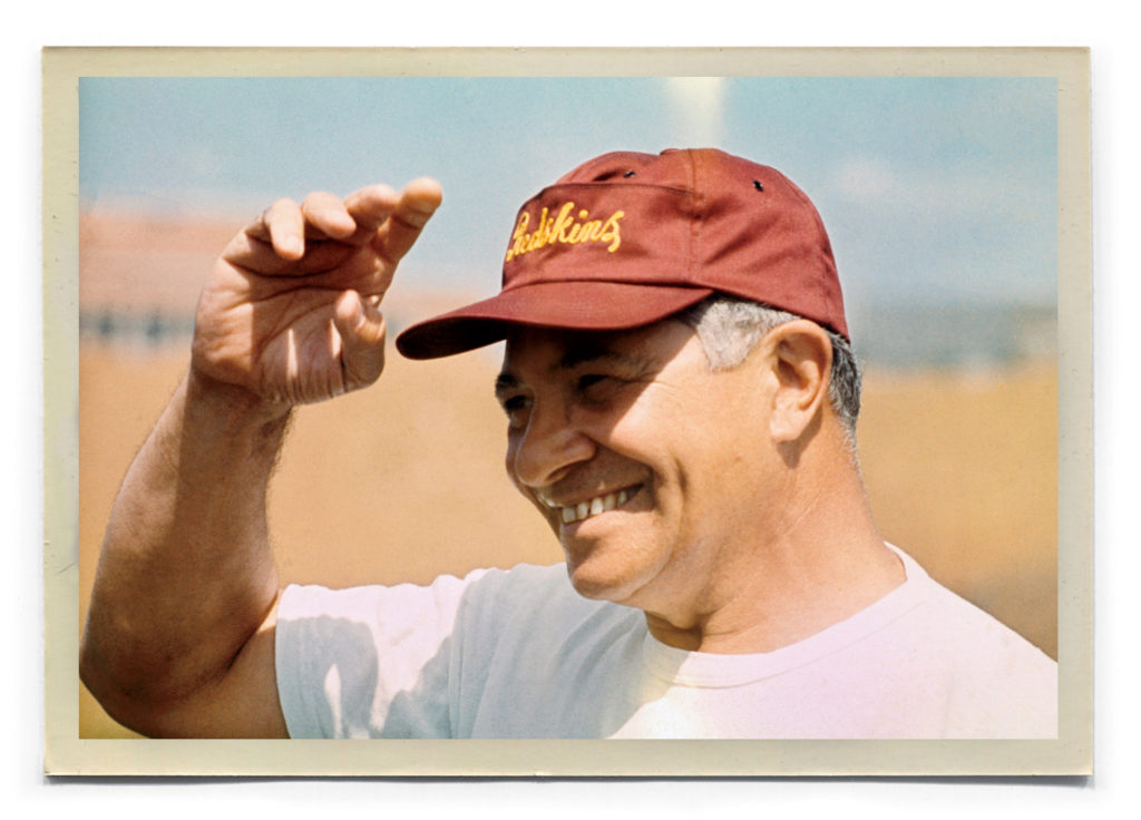 Lombardi cracks a smile on the first day of Redskins training camp.