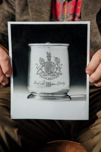 An archival photo of a stolen 1734 mug linked to George II.