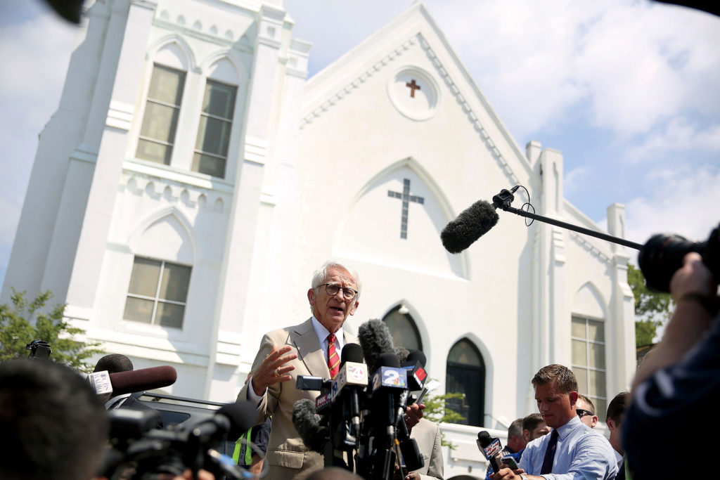 Riley addresses the media in front of Emanuel A.M.E. Church.