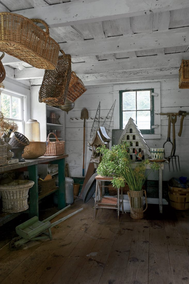 Baskets and birdhouses in the potting shed.