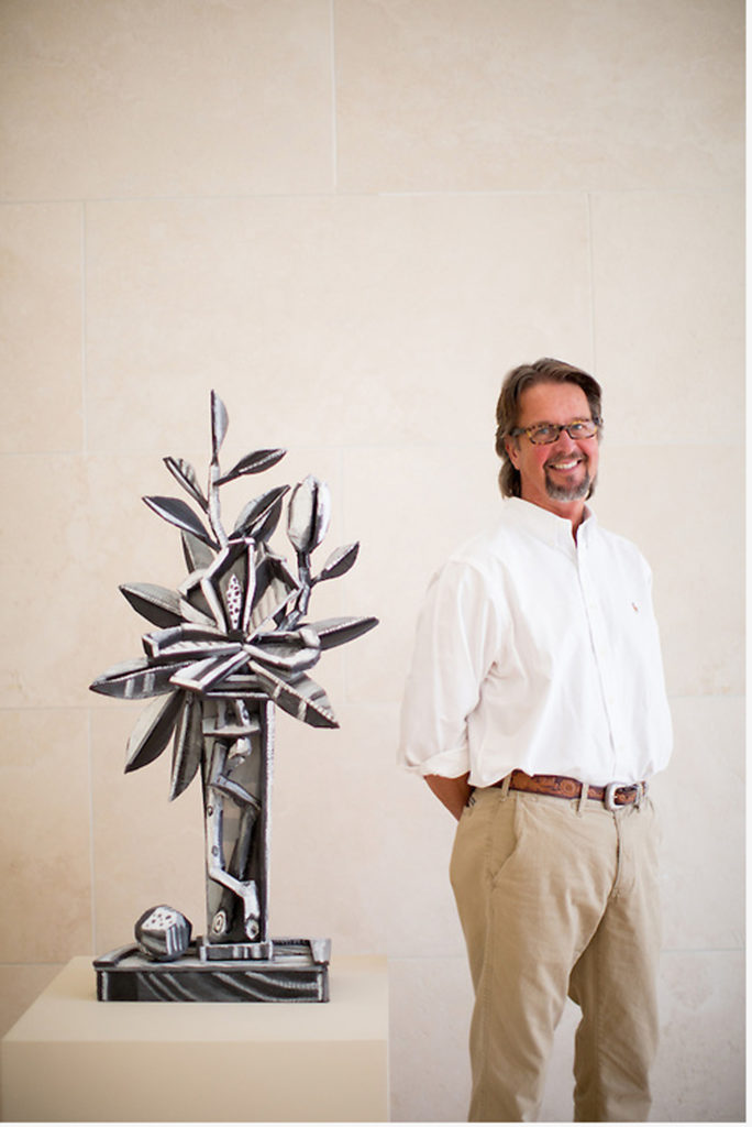 Bates with his sculpture Magnolia, 2013.