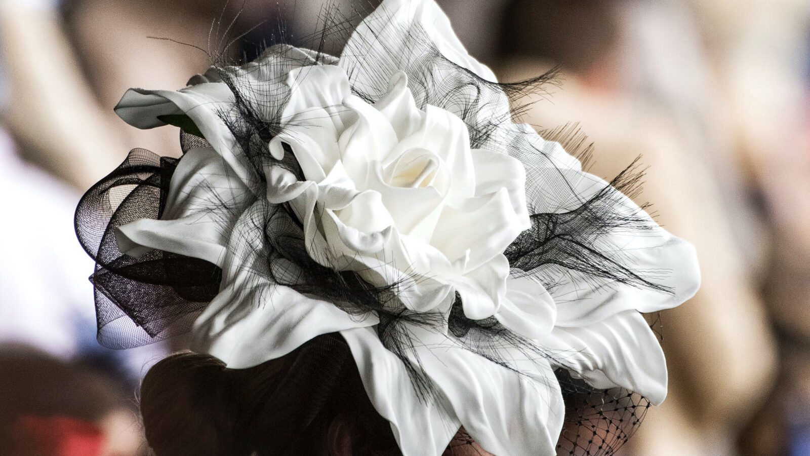 A woman with a derby hat
