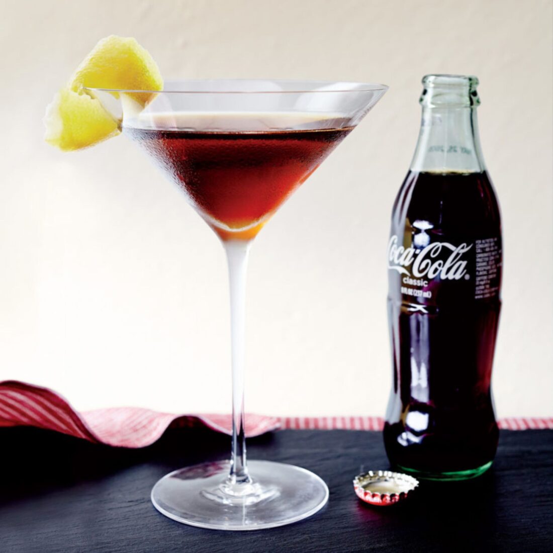 Bourbon & Coke
This “reengineered” version of the classic Southern concoction uses a Coca-Cola syrup to lightly flavor a shot of bourbon.
Get the recipe.