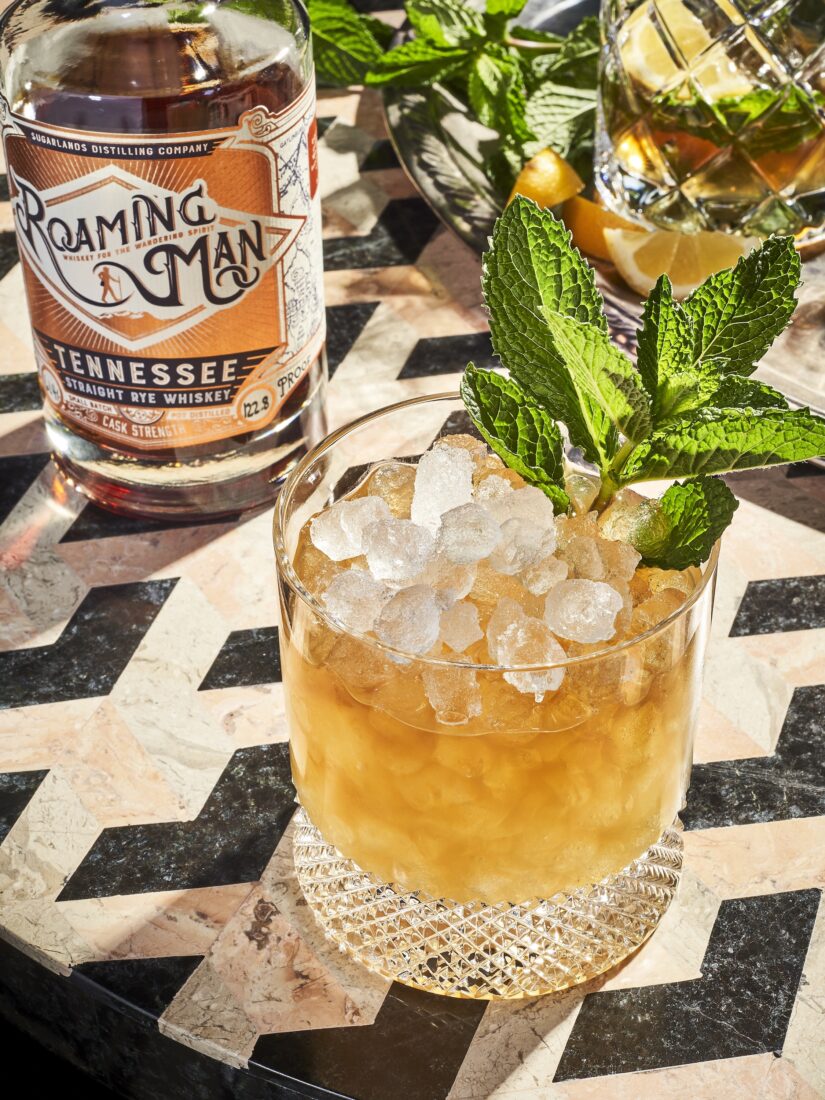 A cocktail in a glass with pebble ice