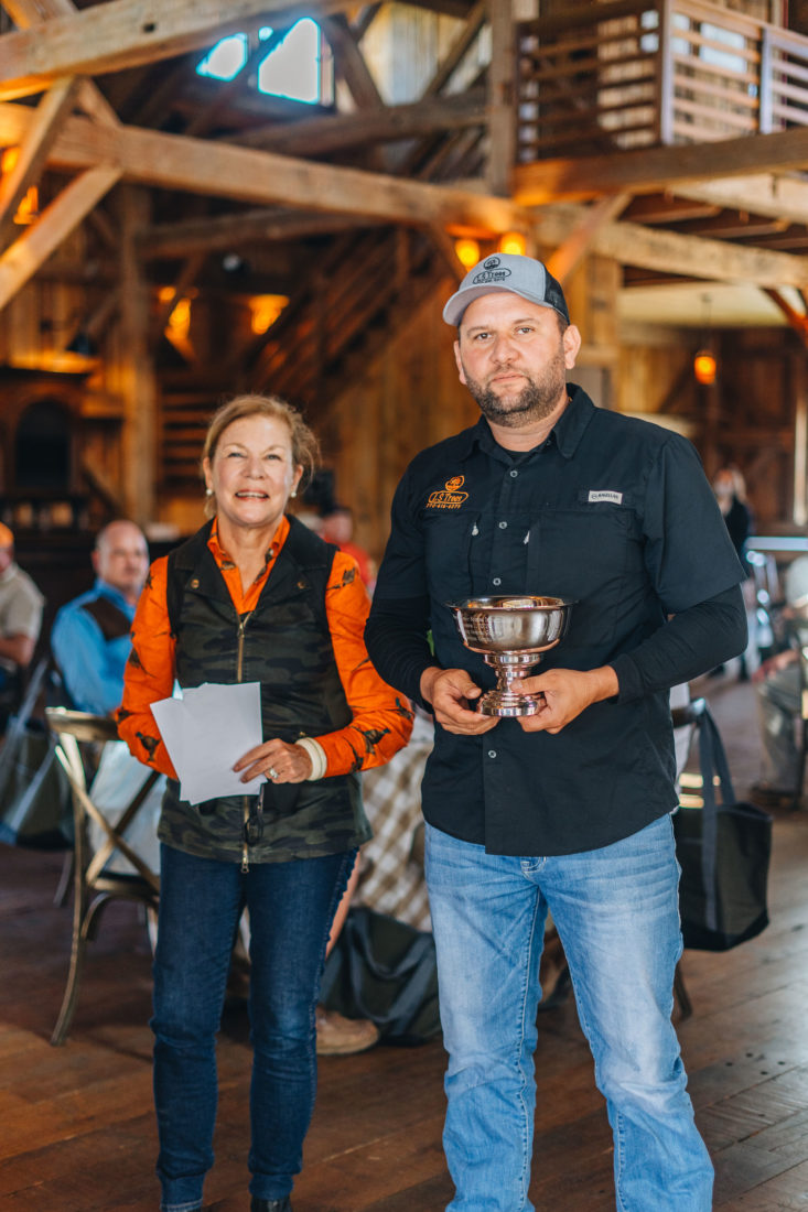 Darwin congratulates Marcelo Oliviero, the highest scoring shooter across both tournaments with a total score of 93/100.