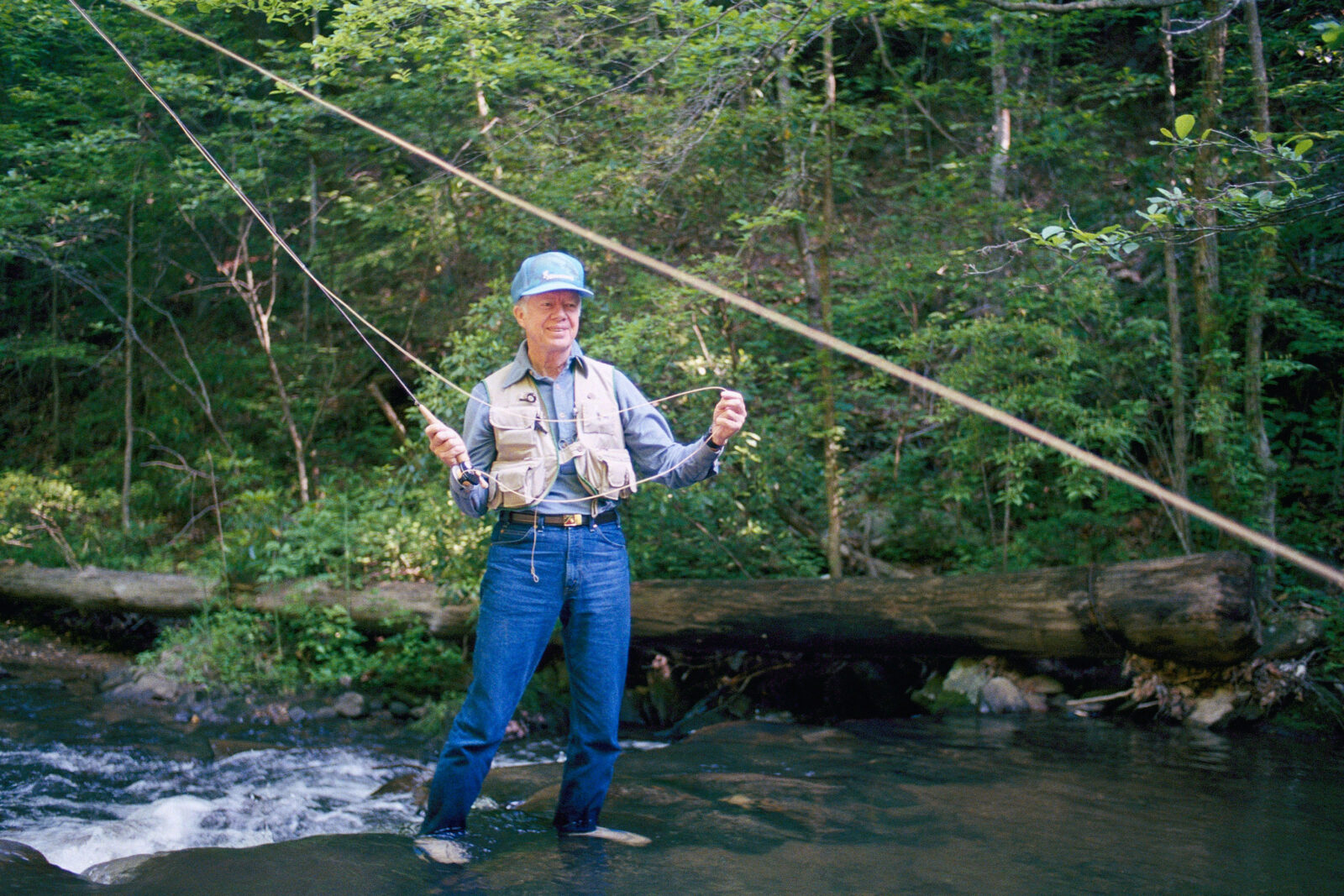 A man fishing in a river
