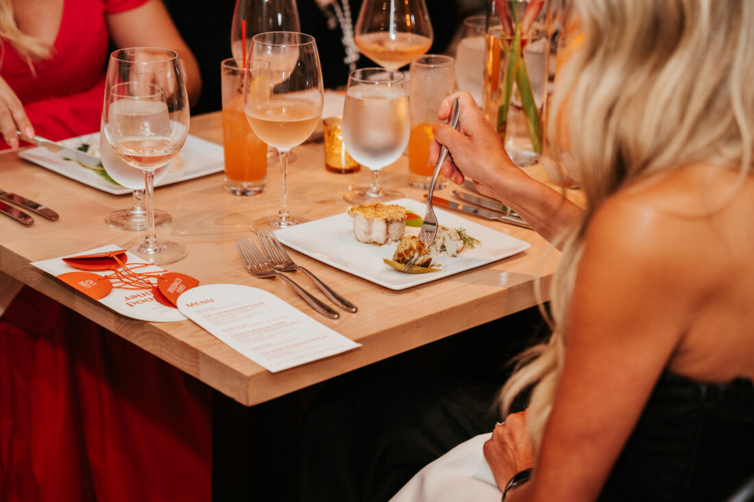 Gulf Coast red snapper roulade with salt and vinegar chips, pink pepper tartar sauce, fire-kissed cauliflower, and pickled okra prepared by chef Alex McPhail of Restaurant IRON.