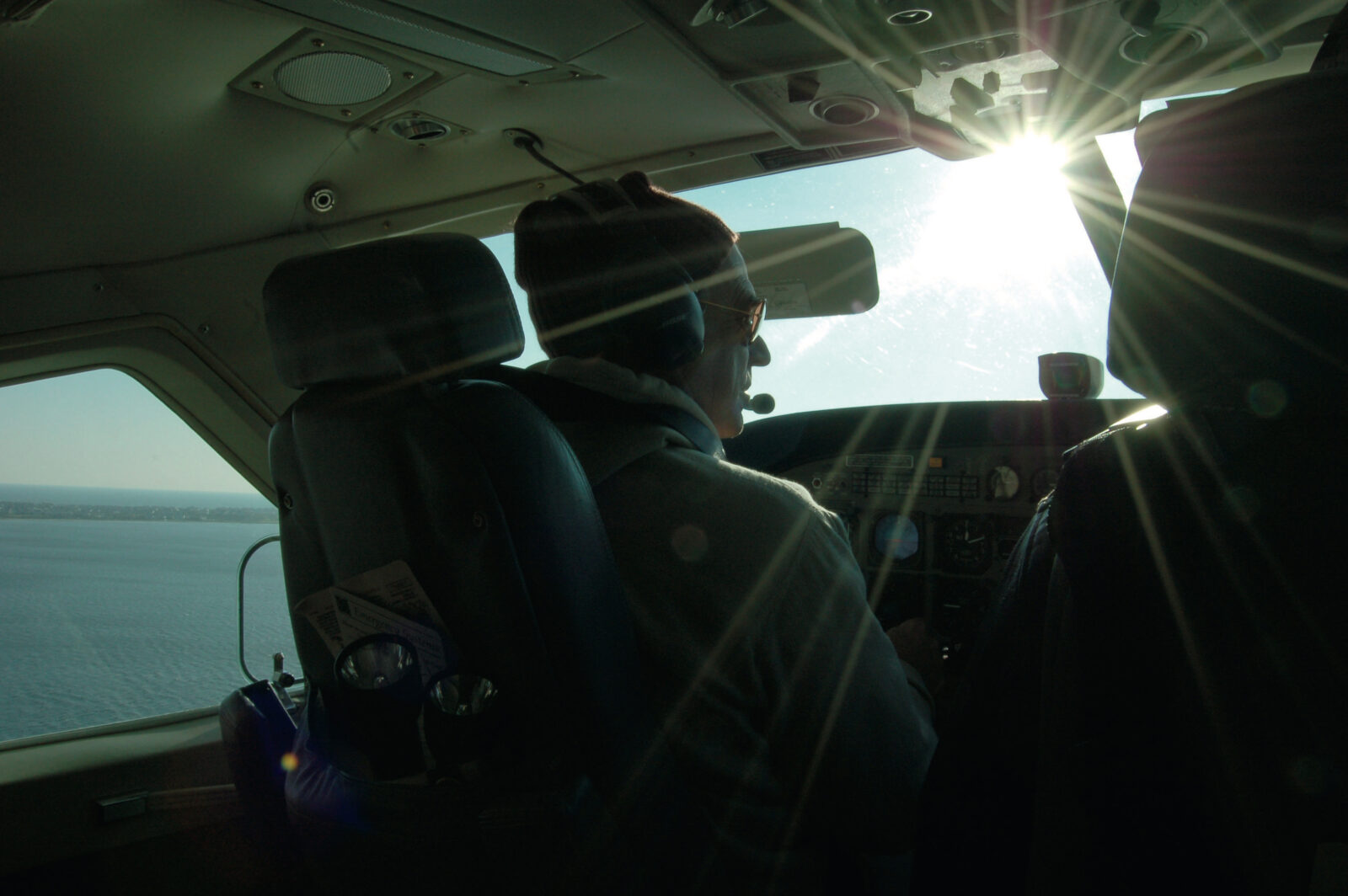 A man pilots a plane