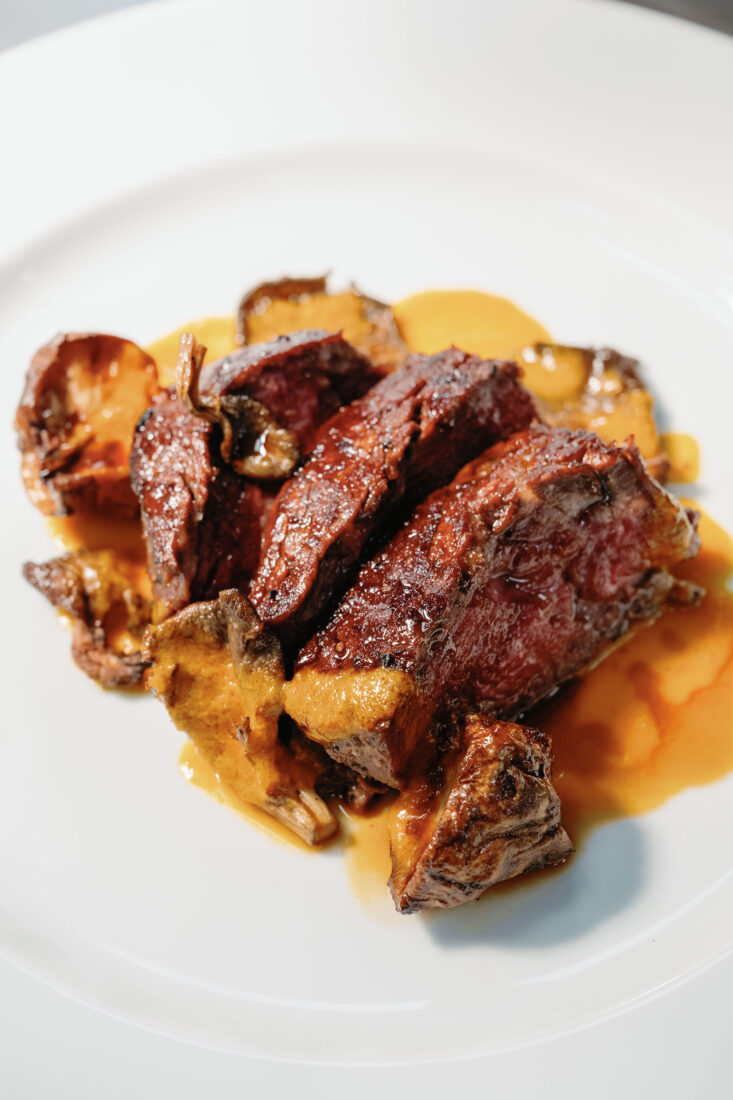 Beef tenderloin kalbi with oyster mushrooms, caramelized sunchokes, kimchi puree, bourbon, and Imperial Soy Sauce glaze.