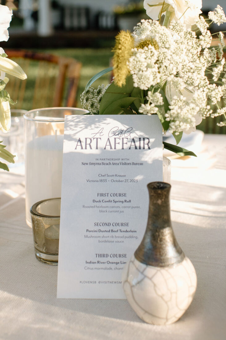 The dinner menu and a ceramic piece from Jane’s Art Center.