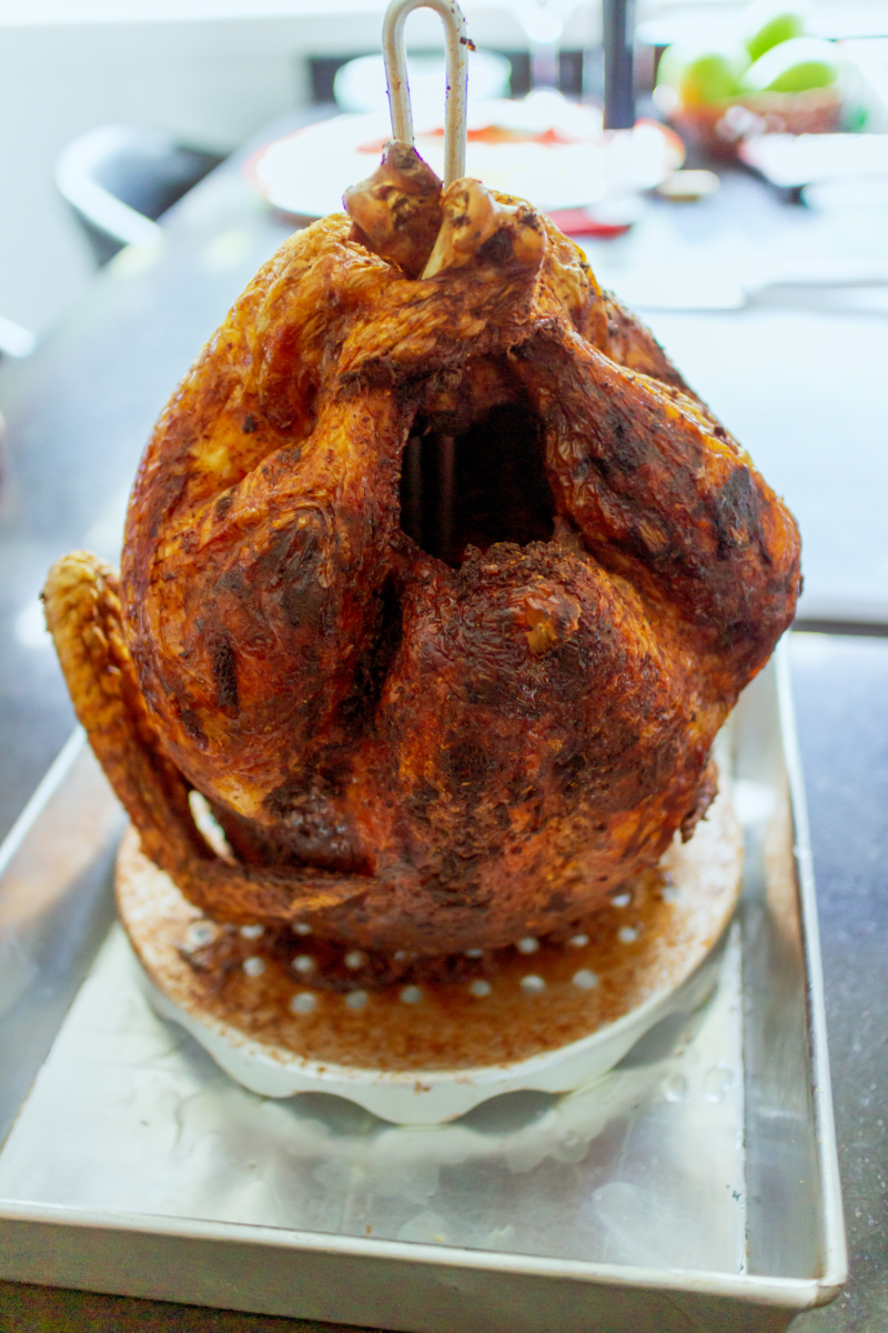 A fried turkey on a stand
