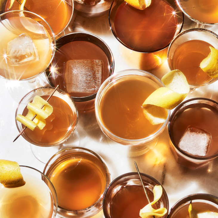 A cluster of drinks with amber liquid