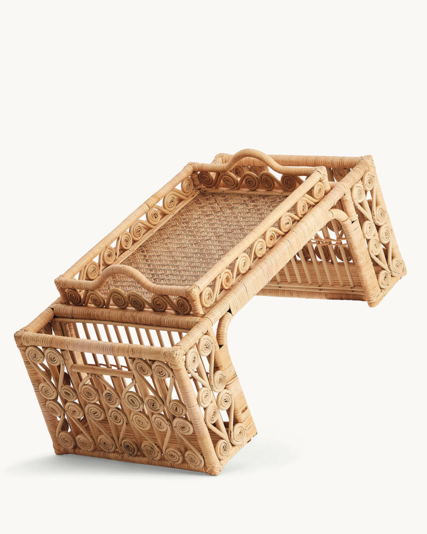 A rattan tray with pockets for magazines and books