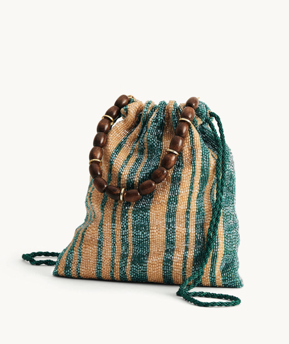 A beaded bag with tan and green stripes