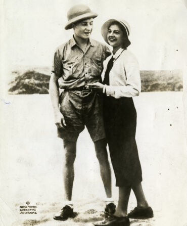 A vintage photo of a smiling man and woman