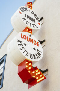 A detail of the retro white and red sign