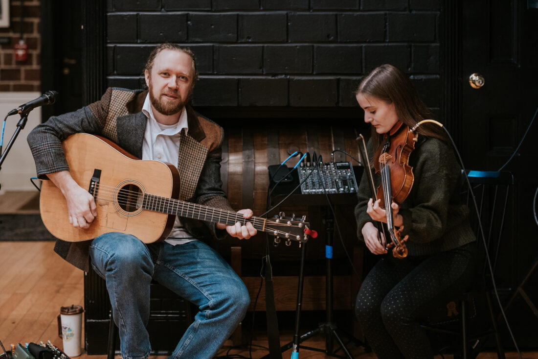Jake Groves and Blakeley Burger perform.