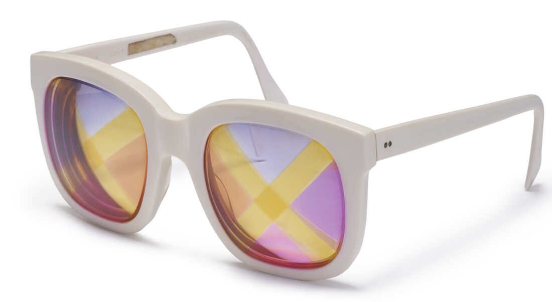 White glasses with retro colored patterns on the lenses