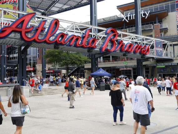 A crowd heading into the Atlanta Braves stadium.