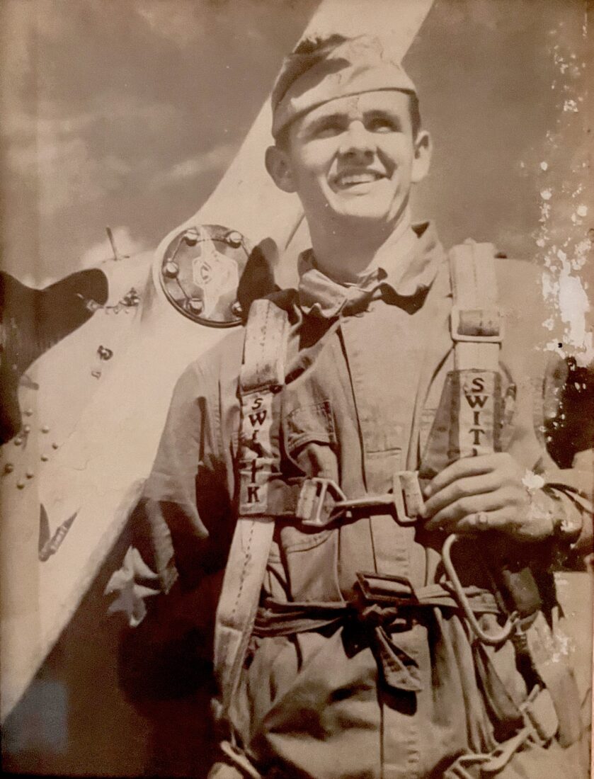A vintage photo of an American fighter pilot from WWII