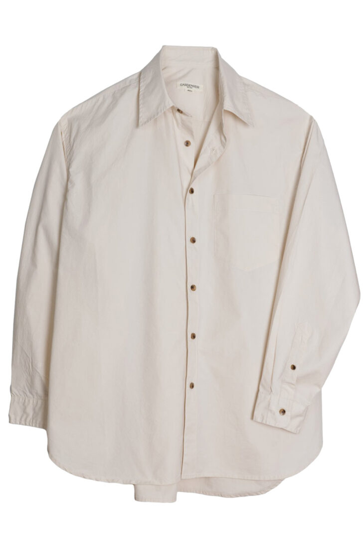 A white cotton oxford style shirt.