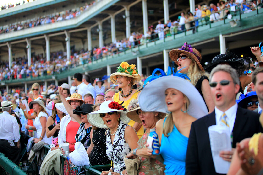 A crowd of people with hats at the Kentucky Derby