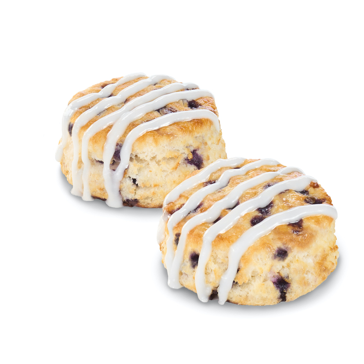 A biscuit with blueberries and icing
