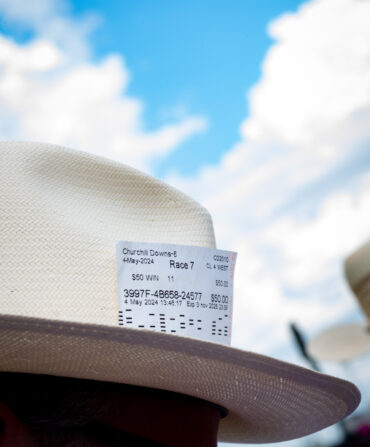 A betting ticket tucked into a hat