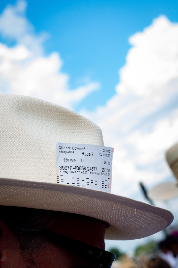 A betting ticket tucked into a hat