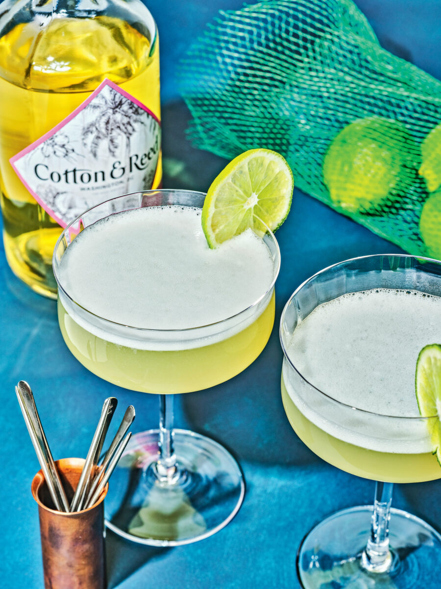A green cocktail with lime