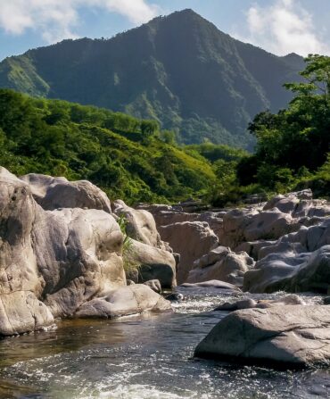 a swimming hole overlooking a mountain