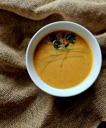 A bowl of yellow soup