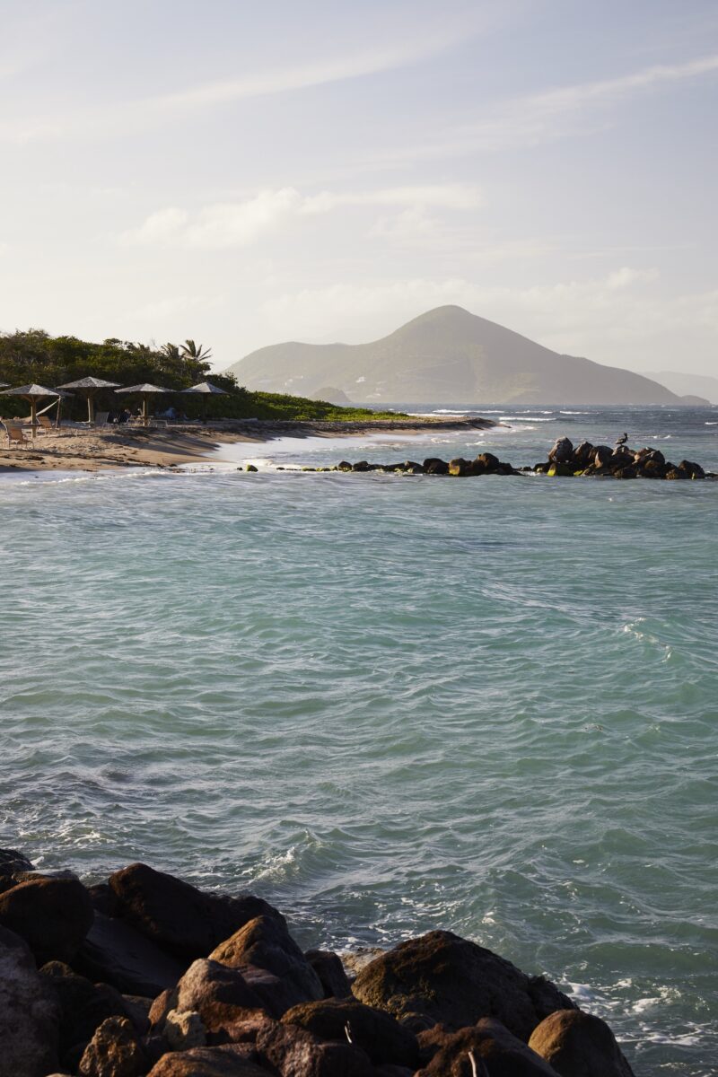 A beach with blue water