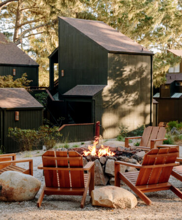 A firepit outside with chairs around it