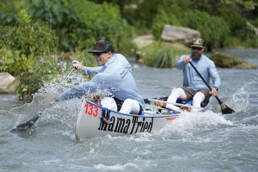 A man kayaks on the river