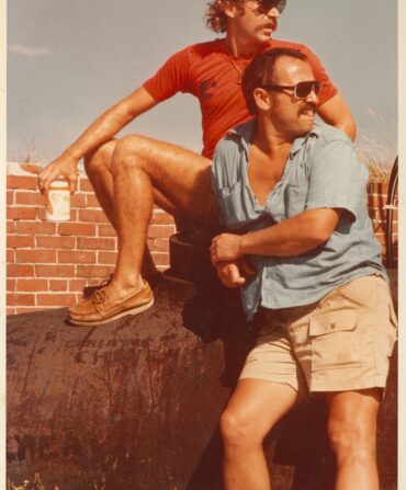 A vintage portrait of two men in shorts