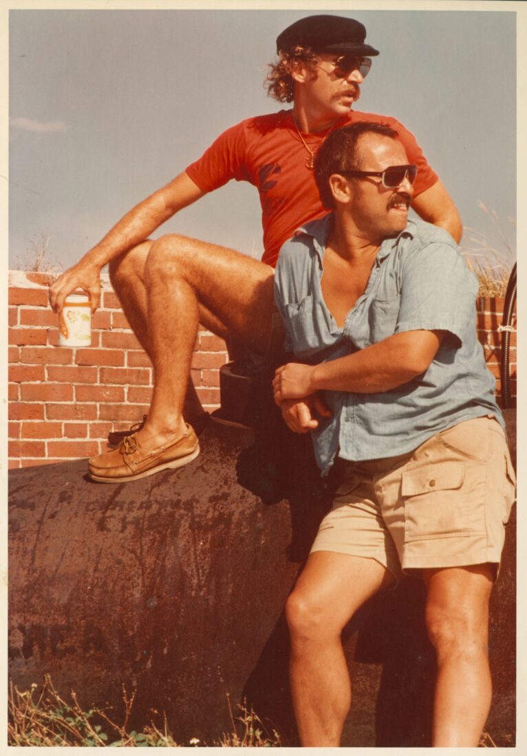 A vintage portrait of two men in shorts