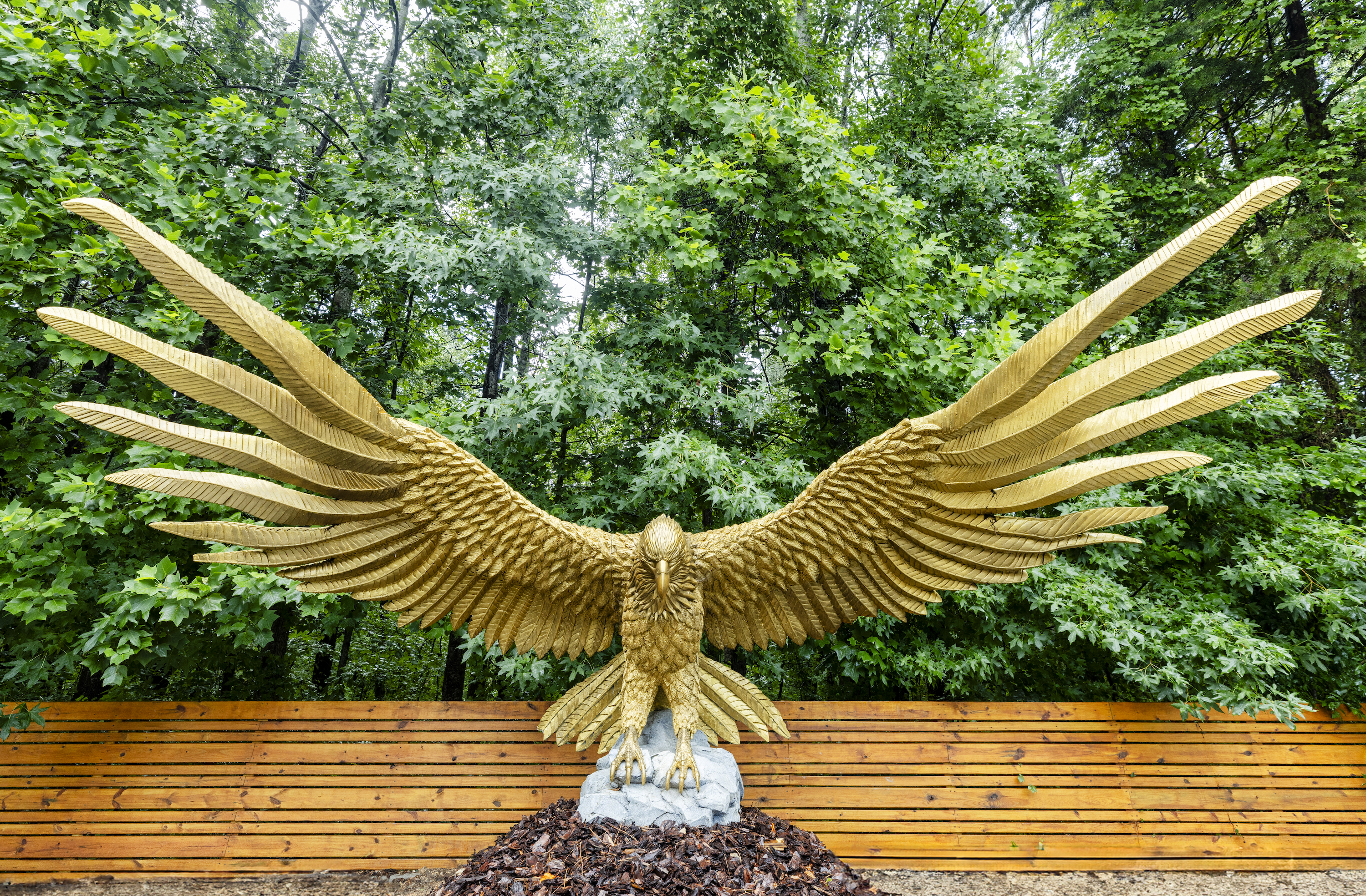 A gold statue of an eagle