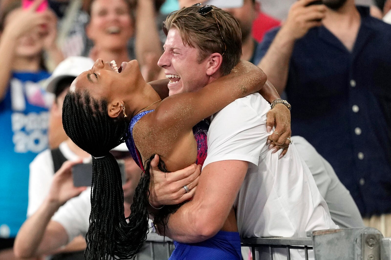 Two people embrace