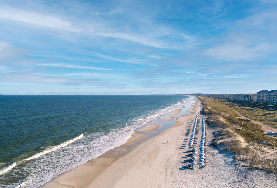 A beach with umbrellas