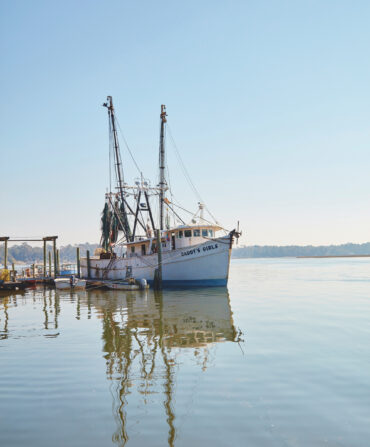 A shrimp boat on the water