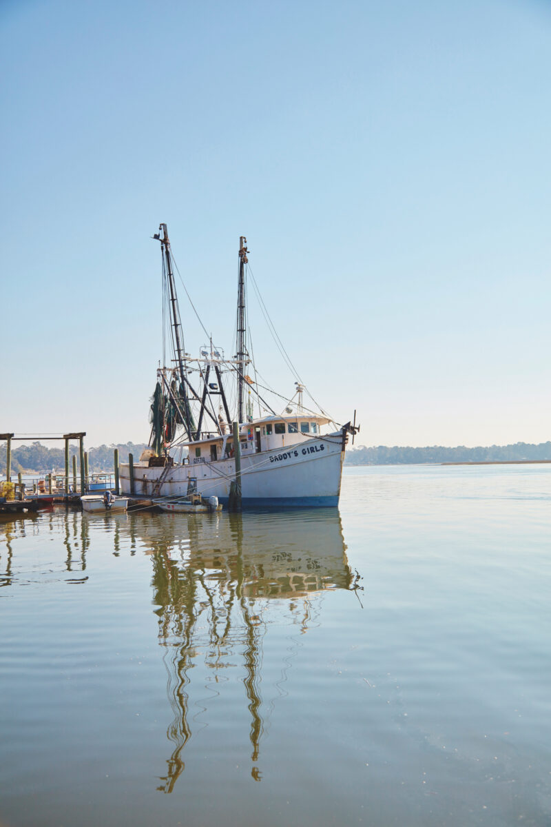 A shrimp boat on the water