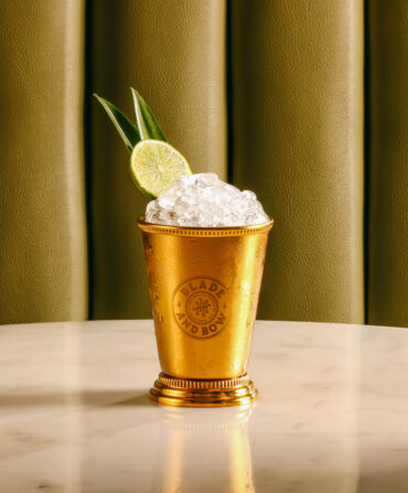 Image of pineapple mule cocktail on a white marble table