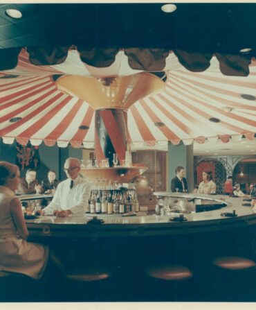 A striped red and white carousel bar