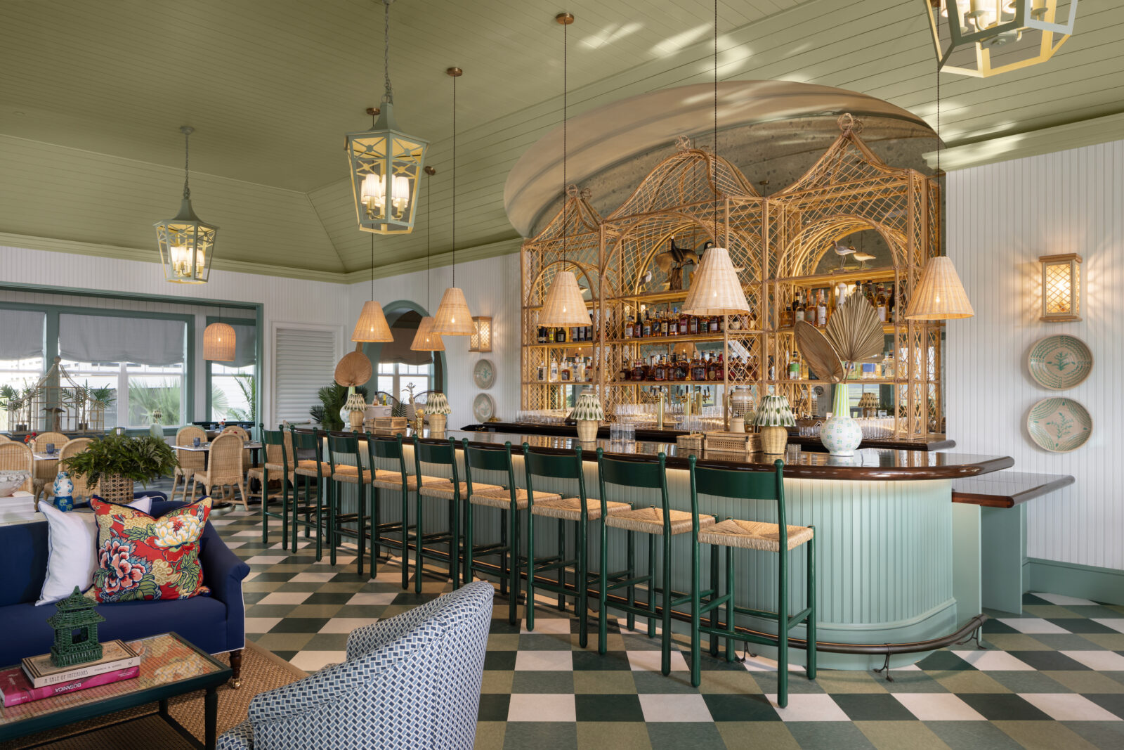 A rounded bar in a green room