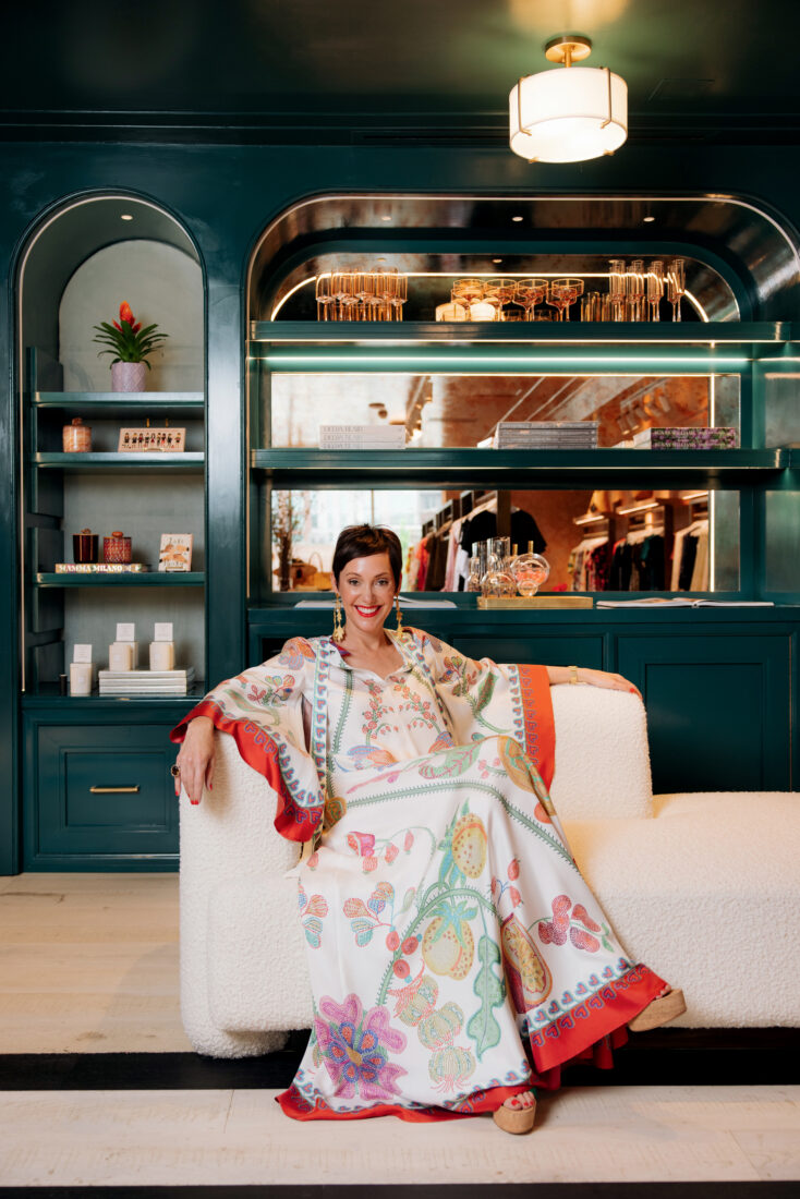 A woman lounges in a navy shop