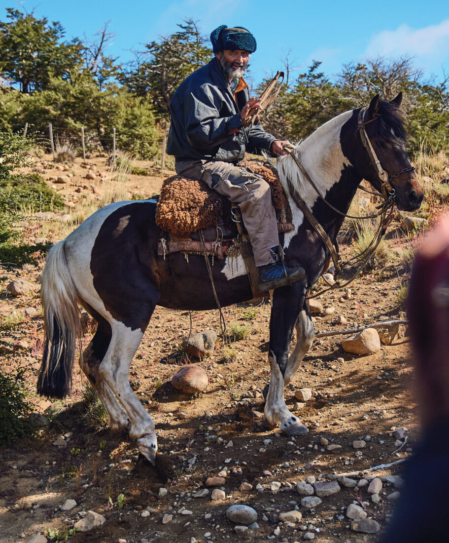 A man on a paint horse